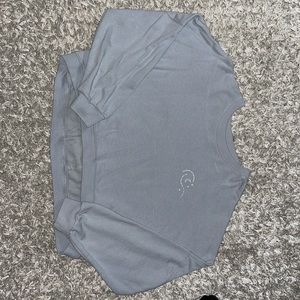 Cotton On baby blue cropped sweatshirt, size Large, small writing on top left